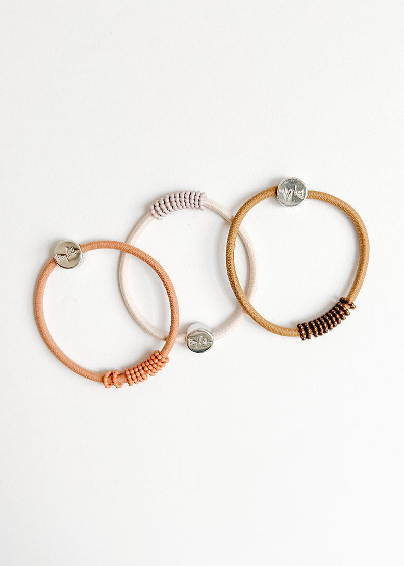 Single Enamel Hair Tie Bracelet - Shaker Sand Dollar